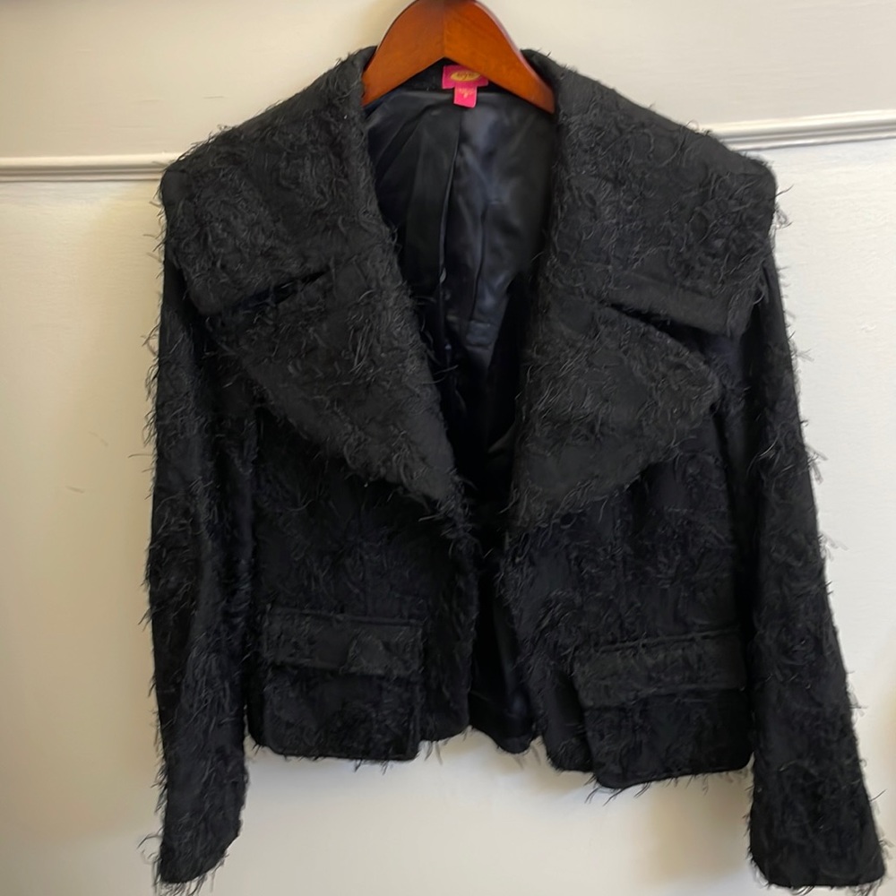 Woman’s black jacket